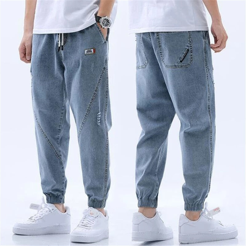 Męskie Jeansy Jogger - Jasne z Sznurkiem w Pasie i Ściągaczami